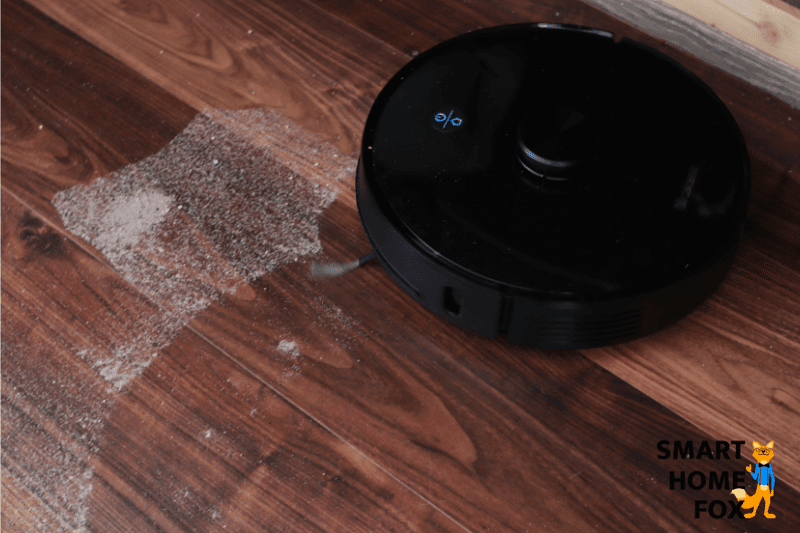 Proscenic M7 pro vacuums sand during the suction review on laminate